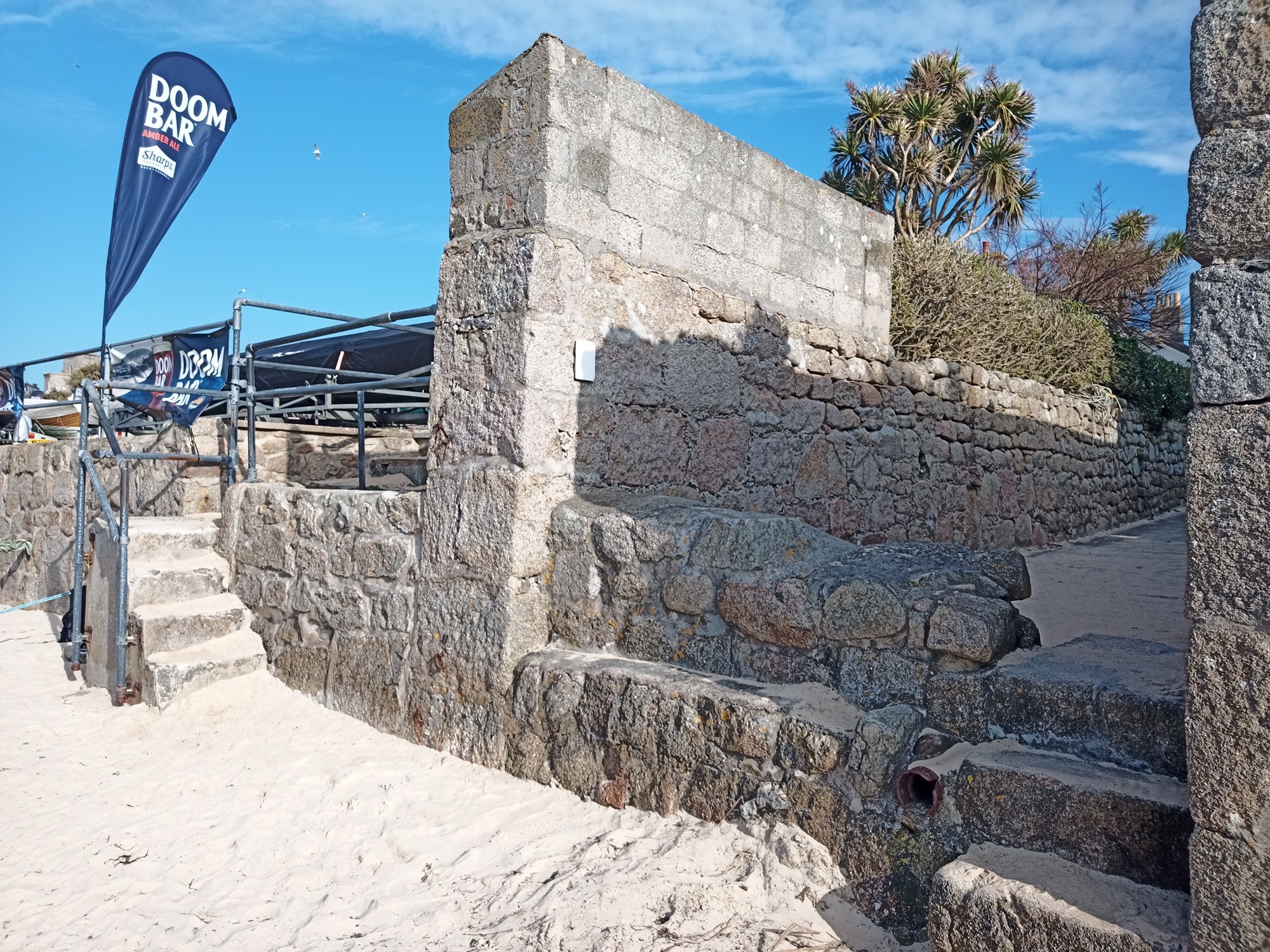 Granite walls and steps that were once part of a gig shed
