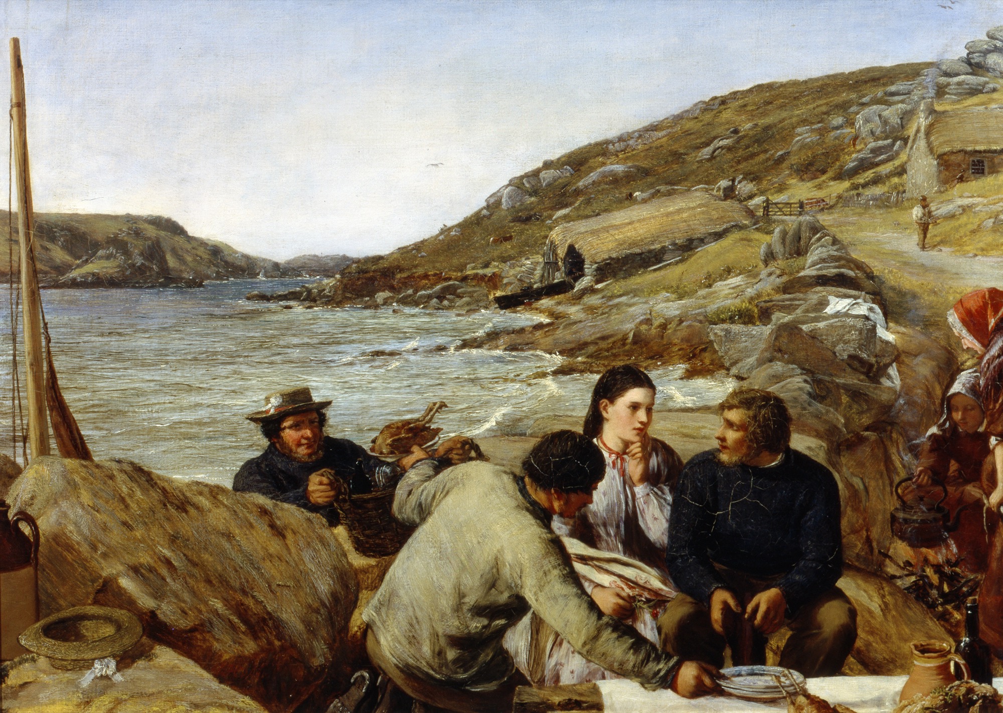 A 19th-century oil painting of a coastal scene with a newlywed sailor and his bride near thatched gig sheds. They sit among fishermen and family, with others preparing food by a fire. The rugged shoreline, stone walls, and boats evoke a maritime community’s daily life, rich in detail and storytelling.